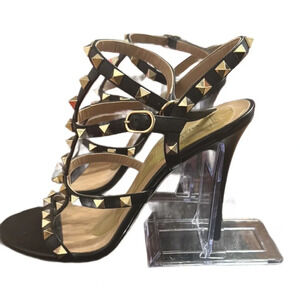 Valentino Garavani
Rockstud 100mm leather sandals
38 NEW NEVER WORN